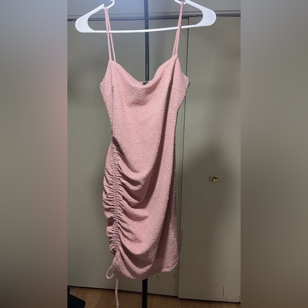 a pink glittery dress, short, size small